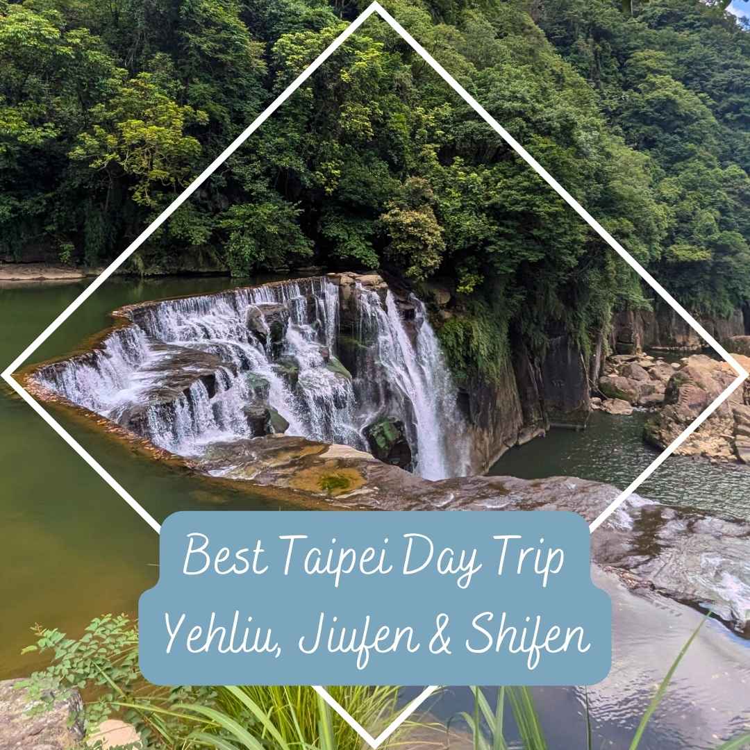 Shifen Waterfall surrounded by lush forest on a Taipei day trip to Yehliu, Jiufen and Shifen